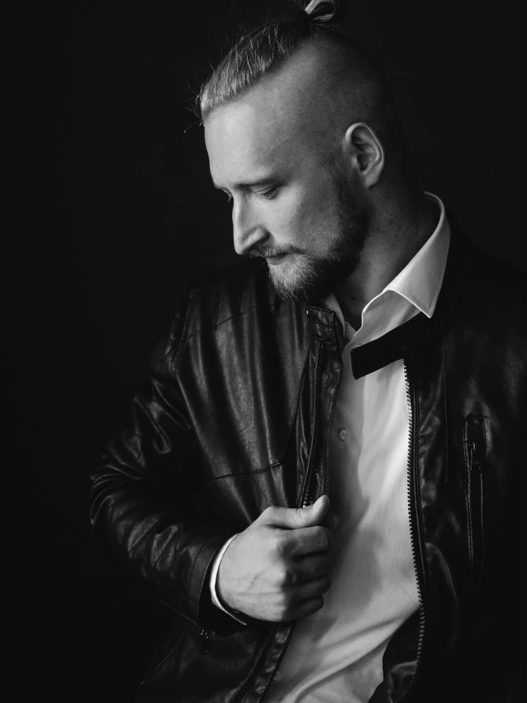 Portrait of Marcus Hale, senior analyst for home, mobility, and finance.