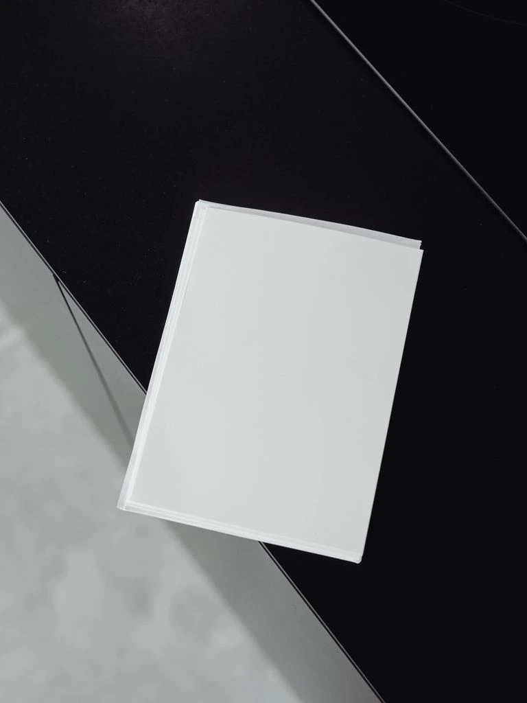 Cover of the 2023 edition, a warm bone field with a single thin ink rule across the upper third.
